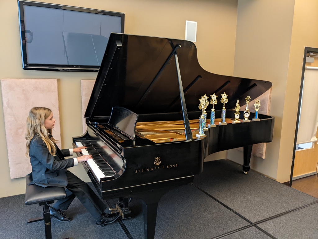 Tyler playing the piano